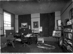 Two men in an office - 1898 Toronto Lithographers